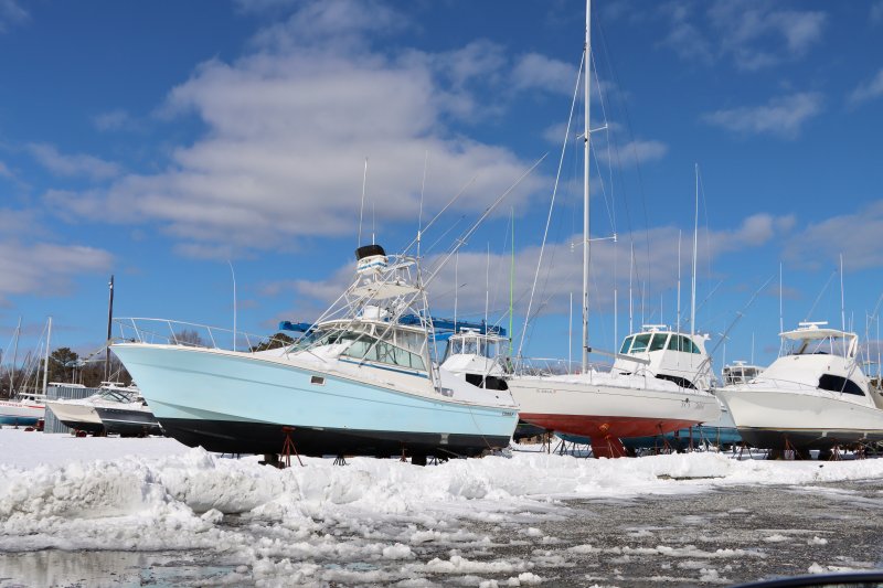 The snow was starting to melt off of boats stored in at
Angler’s Marina in Lewes.